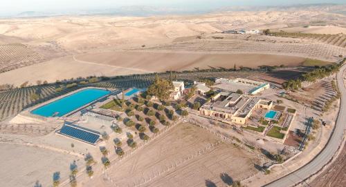 an aerial view of a resort in the desert at Terre De Traces Ecolodge in Sefrou
