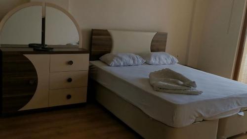 Postel nebo postele na pokoji v ubytování triplex villa