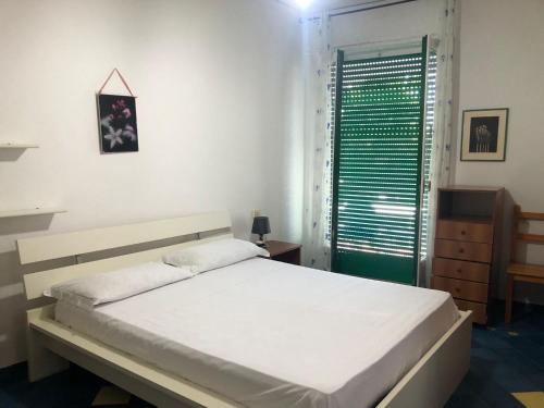 Een bed of bedden in een kamer bij Casa Vacanze Teresa