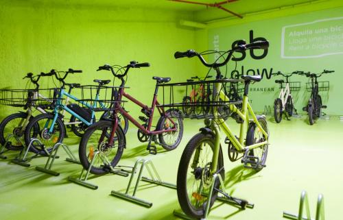 a group of bikes on display in a room at Hotel SB Glow 4 Sup in Barcelona