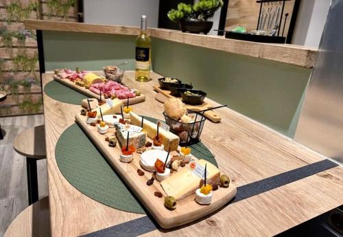 a tray of food on top of a table at Appartement Love Room/Jacuzzi in Toulouse