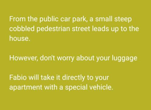 a yellow sign that reads from the public car park a smallstep coblished at Private Romantic Wellness Lake View Retreat- Whirlpool Hammam Spa e Piscina panoramica in Maccagno con Pino e Veddasca