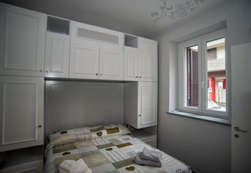 Postel nebo postele na pokoji v ubytování Corte Paradiso
