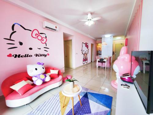ein Wohnzimmer mit einem Hello Kitty Wall Aufkleber in der Unterkunft Puchong HELLO KITTY FULLY AIR-CON Suite in Puchong