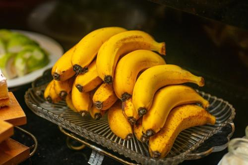 a bunch of bananas sitting on top of a basket at Hanoi La Palm Premier Hotel & Spa in Hanoi