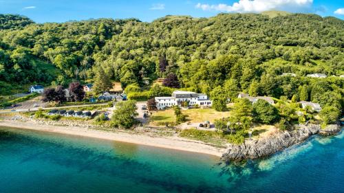 an aerial view of a house on a beach at Onich Hotel & Lochside Beach Pods in Onich