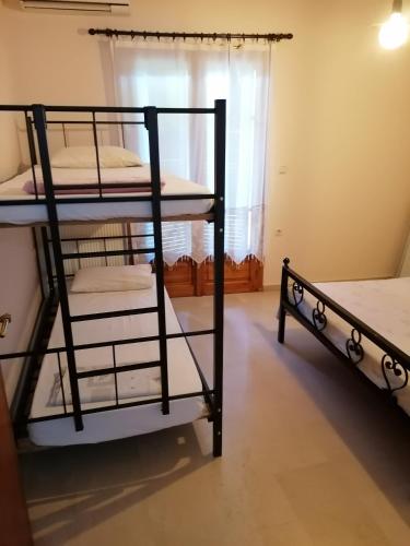 Postel nebo postele na pokoji v ubytování Genesis