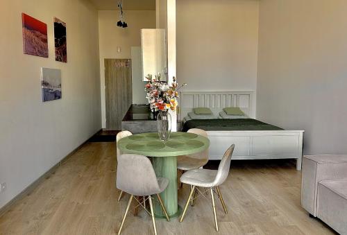 Posteľ alebo postele v izbe v ubytovaní Loft przy Placu Niepodległości