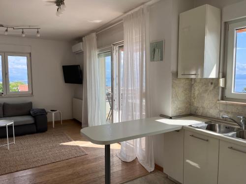 Kuchyňa alebo kuchynka v ubytovaní Peachy House