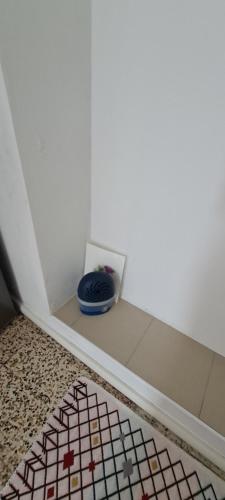 a room with a blue bowl on a shelf at Da Ersilia in Cernobbio