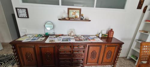 a room with a wooden desk with a mirror at Da Ersilia in Cernobbio