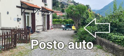 a picture of a house with a poseo anime sign at Da Ersilia in Cernobbio