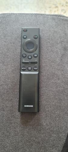 a samsung remote control sitting on top of a table at Da Ersilia in Cernobbio