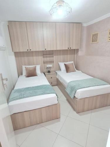 Llit o llits en una habitació de Appartement Sable blanc