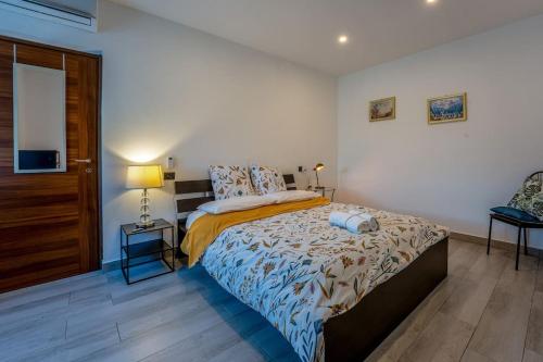 מיטה או מיטות בחדר ב-Appartamento borgo antico
