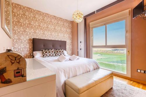 Postel nebo postele na pokoji v ubytování A&N La Vega 14, Torre del Mar