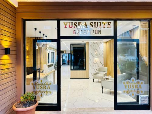 a store front with a sign for a vista smile reception at Yusra Apart Otel in Trabzon