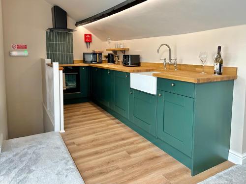 Kuchyň nebo kuchyňský kout v ubytování Minster Heights