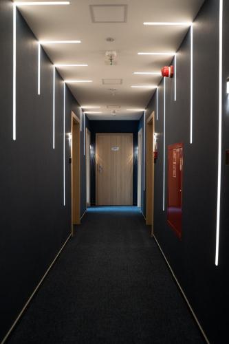 a corridor of a hallway with a long hallway at BULVAR in Malbork