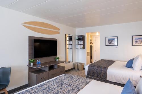 Una cama o camas en una habitación de The Forum