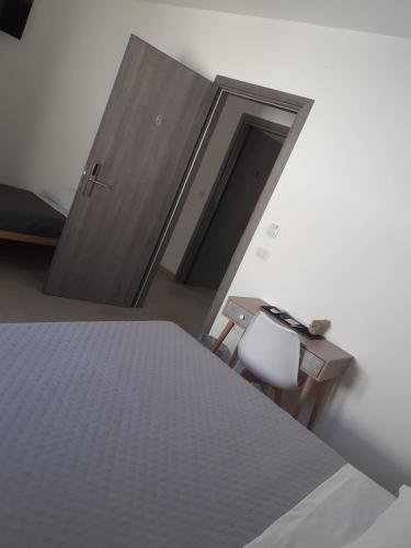 Ένα ή περισσότερα κρεβάτια σε δωμάτιο στο Eliseo's rooms