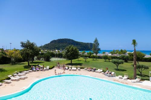 a view of a swimming pool at a resort at Borgo di Fiuzzi Resort & SPA in Praia a Mare