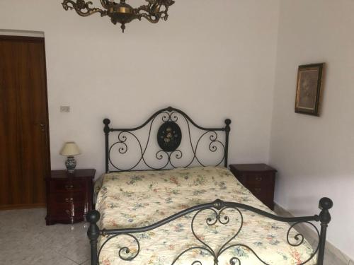 Ένα ή περισσότερα κρεβάτια σε δωμάτιο στο Teseo Holiday