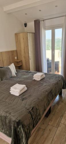 Postel nebo postele na pokoji v ubytování L'Escale chambres privées chez l'habitant JFDL