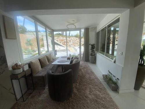 Posezení v ubytování Villa design vue panoramique
