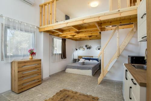 Postel nebo postele na pokoji v ubytování Marti Garden Suites