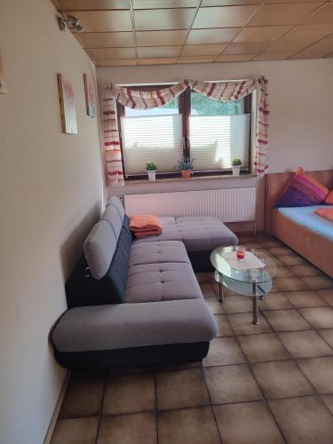 Posezení v ubytování Appartement am Waldesrand