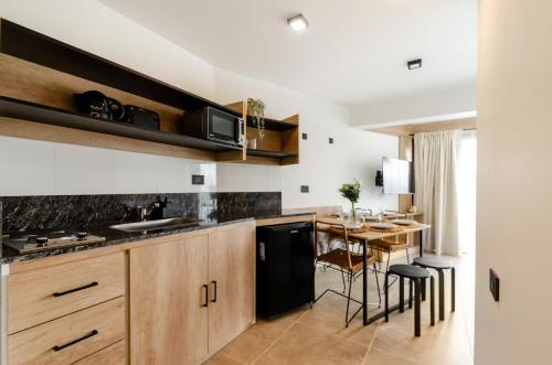 Kuchyň nebo kuchyňský kout v ubytování Villa Huapi