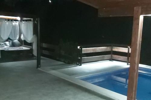 a swimming pool in a room with at Villa Hedonic in Ulcinj