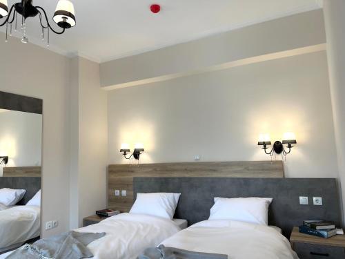 Un pat sau paturi într-o cameră la Zilean apartments by Airstay