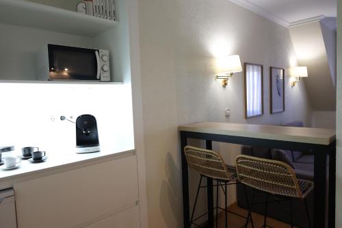 Η κουζίνα ή μικρή κουζίνα στο Hotel Maruxia *** Superior