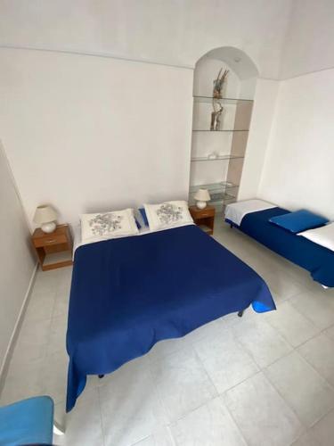 Posteľ alebo postele v izbe v ubytovaní Bilo Tripoli by Garganoin