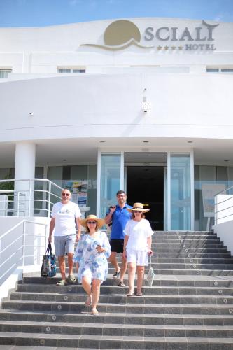 a group of people walking up the stairs of a cruise ship at Hotel Scialì in Vieste