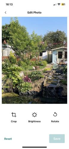 a screenshot of a website with a picture of a garden at Beautiful double bedroom in Hillingdon