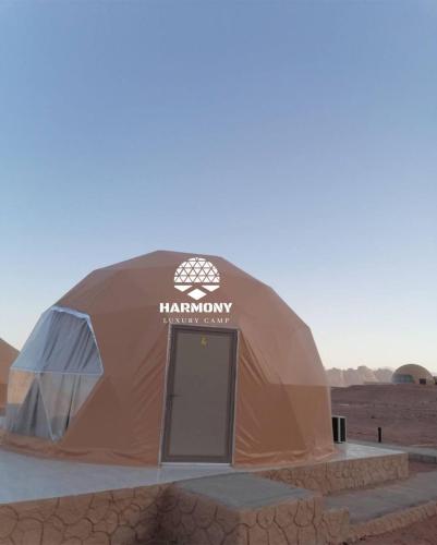 a large tent in the middle of the desert at Harmony Luxury Camp in Wadi Rum
