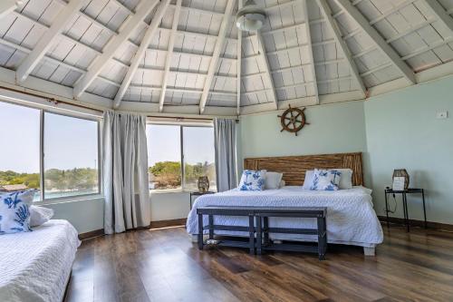 Voodi või voodid majutusasutuse Fragata Island House toas