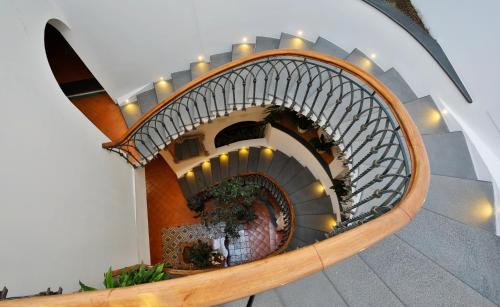 a spiral staircase in a building at Hotel Residence in Amalfi