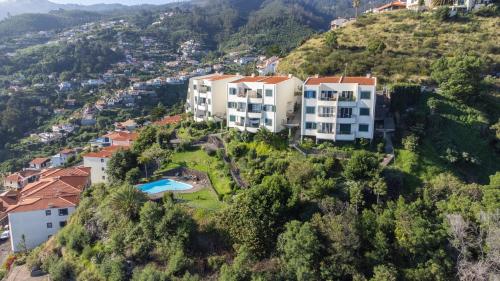 an aerial view of a house on a hill at Tucha's Apartement in Funchal