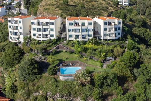 an aerial view of a villa with a resort at Tucha's Apartement in Funchal
