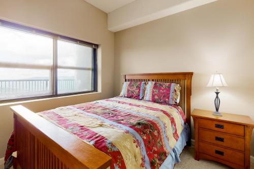 a bedroom with a bed and a window at Sugar Top 2621 in Sugar Mountain
