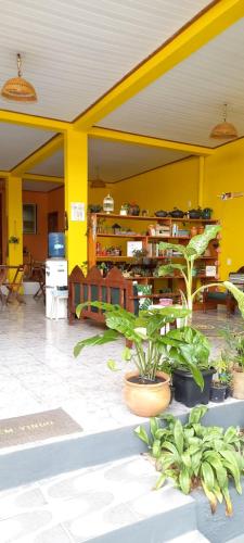 Restoran atau tempat lain untuk makan di Casa da Vila - Hospedaria - 3 min do centrinho de Alter