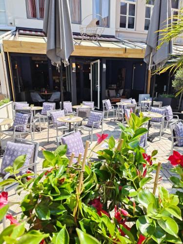 Un restaurante u otro lugar para comer en Hotel Leopold