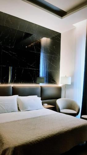 Katil atau katil-katil dalam bilik di BAARIA House Hotel