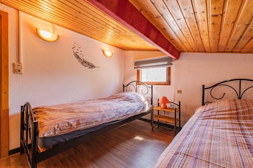 Postel nebo postele na pokoji v ubytování Gite Haven