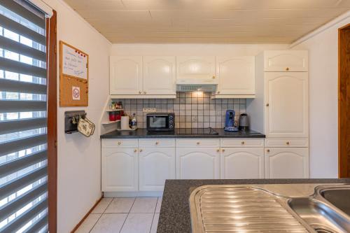 Una cocina o zona de cocina en Gite Haven