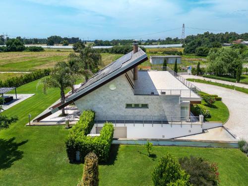 an aerial view of a house with a roof at Casale Delle Ronde B&B in Latina